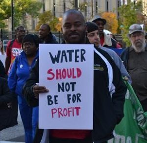 Protester supporting public water