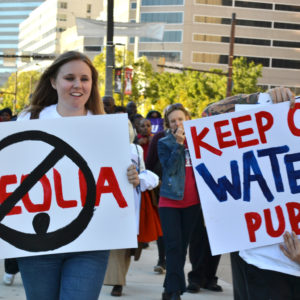 Lauren DeRusha Corporate Accountability at Baltimore water privatization rally.
