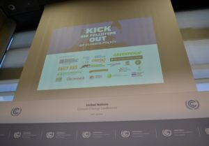 Display at the press conference of logos from many of the organizations jointly calling on the UNFCCC to kick big polluters out of climate policymaking.