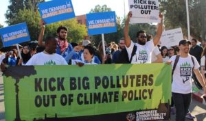 Corporate Accountability organizers demonstrate during COP22.