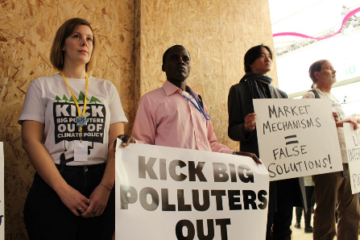 Corporate Accountability organizers demand Big Polluters to stand down at climate talks