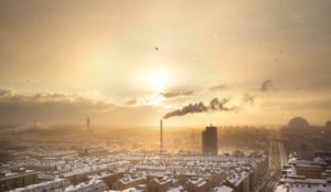 Bird's-eye view of factories polluting a town at sunset. Photo: Petter Rudwall