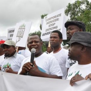 Environmental Rights Action/Friends of the Earth, Nigeria tells Chevron to stop manipulating climate talks. Photo: Corporate Accountability International