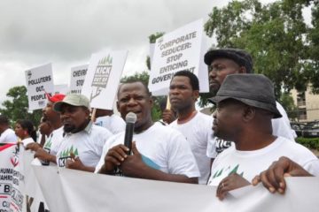 Environmental Rights Action/Friends of the Earth, Nigeria tells Chevron to stop manipulating climate talks. Photo: Corporate Accountability International