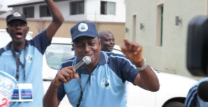 Akinbode Oluwafeme at a rally for Our Water, Our Right coalition.