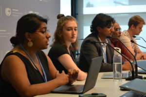 Panelists speak at a press conference on Big Polluters' conflicting interests at the global climate treaty talks.
