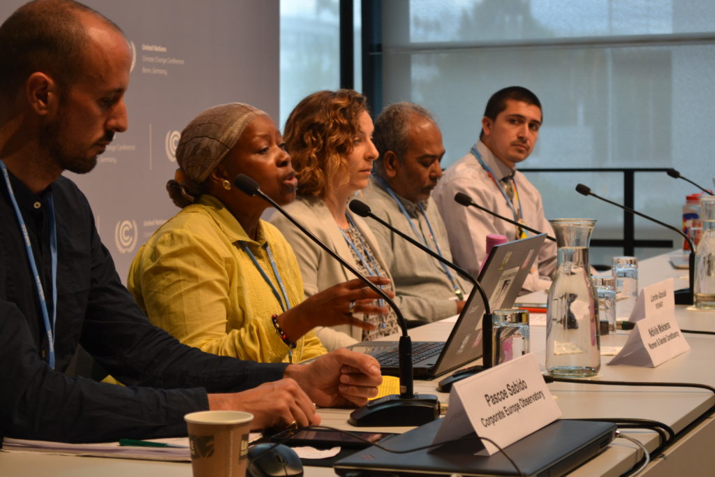 Left to right: Pascoe Sabido, Corporate Europe Observatory, moderates a press conference on Big Polluters and conflicts of interests featuring Ndivile Mokoena representing the Women & Gender constituency; Lorine Azoulai, Youth constituency; Souparna Lahiri, Demand Climate Justice; and Michael Charles, Indigenous Peoples’ Caucus and member of the Navajo Nation. 