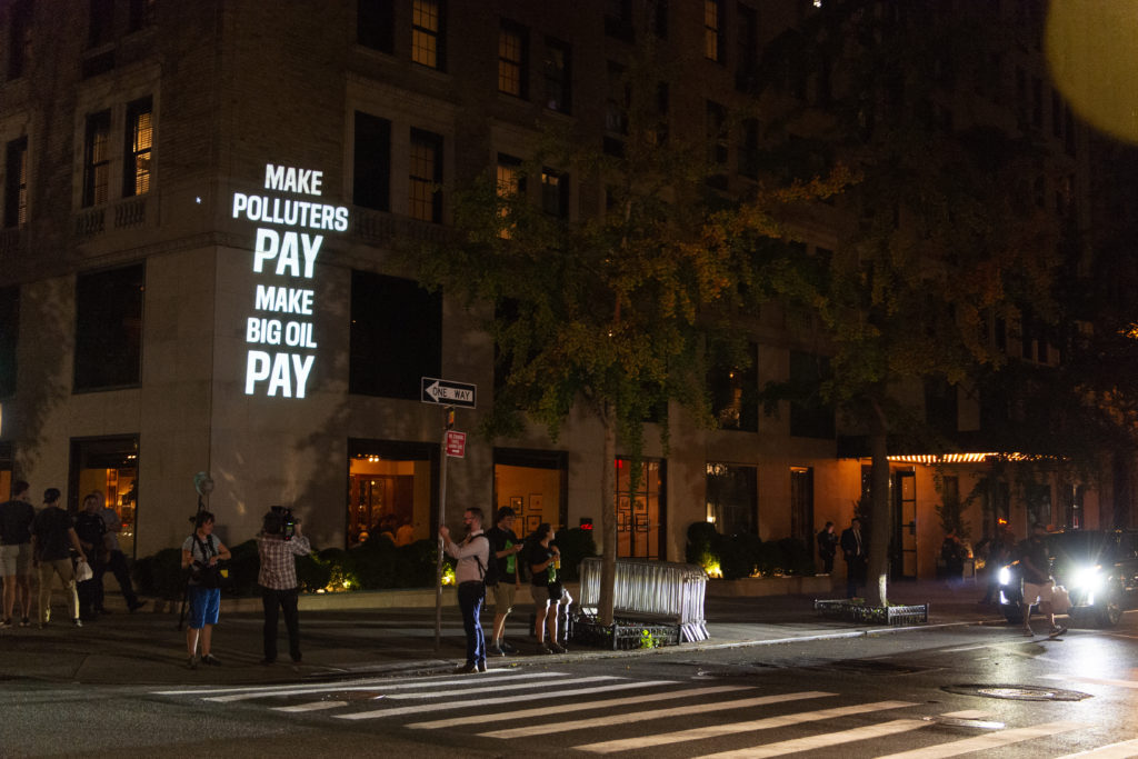 Make Big Polluters pay projected on the Gramercy Park Hotel during UN climate week in New York City