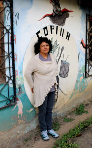 Women challenging corporate power: Berta Caceres stands at the COPINH (the Council of Popular and Indigenous Organizations of Honduras) offices in La Esperanza, Intibucá, Honduras.