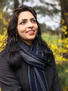 Portrait photograph of Ashka Naik, research director at Corporate Accountability.