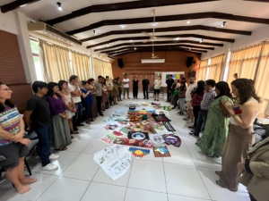 A group of activists gather for a strategy session