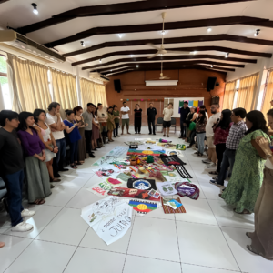 A group of activists gather for a strategy session