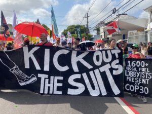 Corporate Accountability staff and activists march at the People's Summit